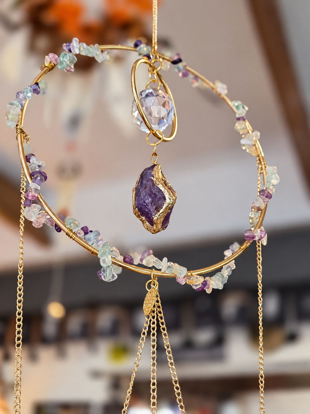 A delicate handmade crystal jewellery mobile at The Wenlock Witch