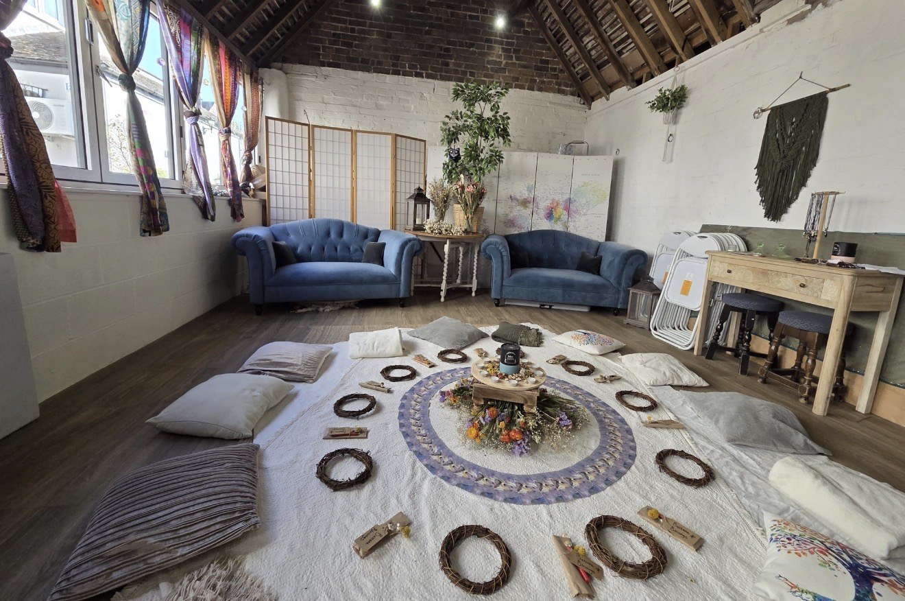 Candlelit circle gathering room at The Wenlock Witch